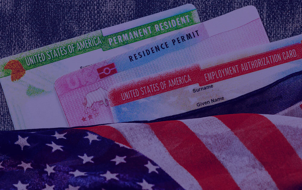 An American flag next to immigration documents